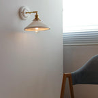 Wandlamp Met Geplooide Kap En Vintage Uitstraling Voor Zachte Binnenverlichting