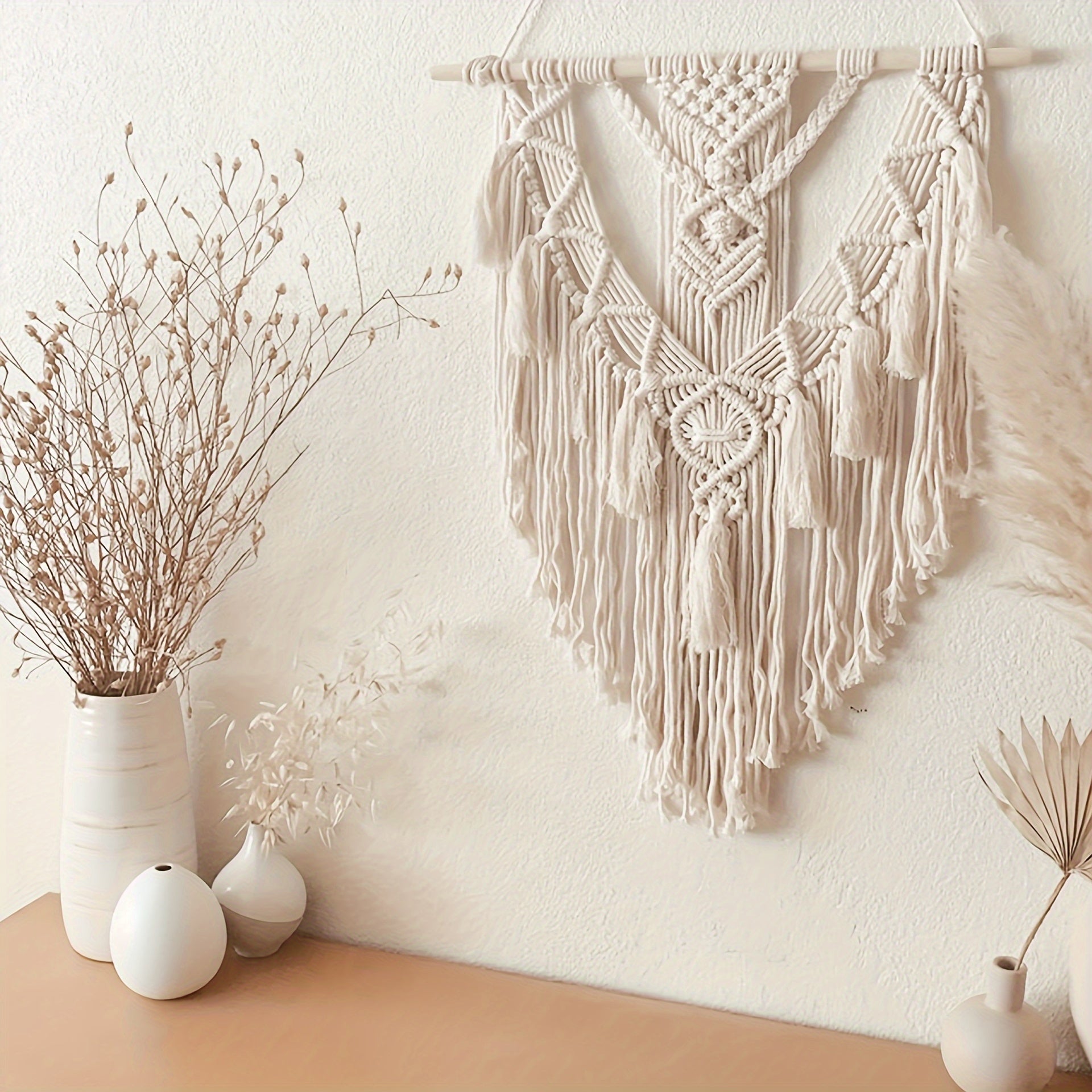 Handgeweven macramé wanddecoratie met franjes en geometrisch patroon