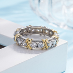 Ring van Koper met Kruisdetails en Gefacetteerde Inzetten