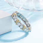 Ring van Koper met Kruisdetails en Gefacetteerde Inzetten