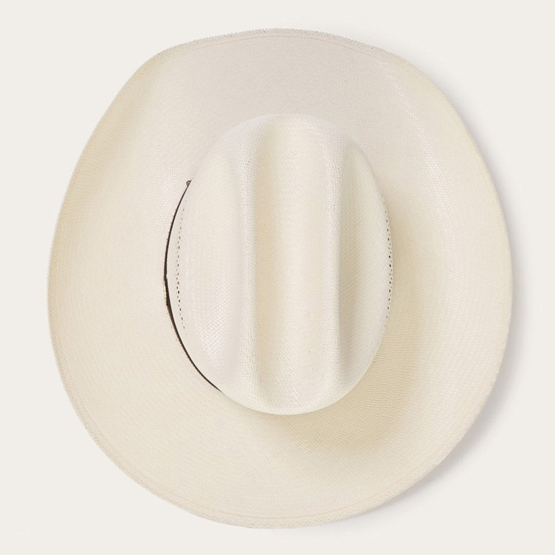 Gevlochten cowboyhoed van stro met decoratieve hoedband