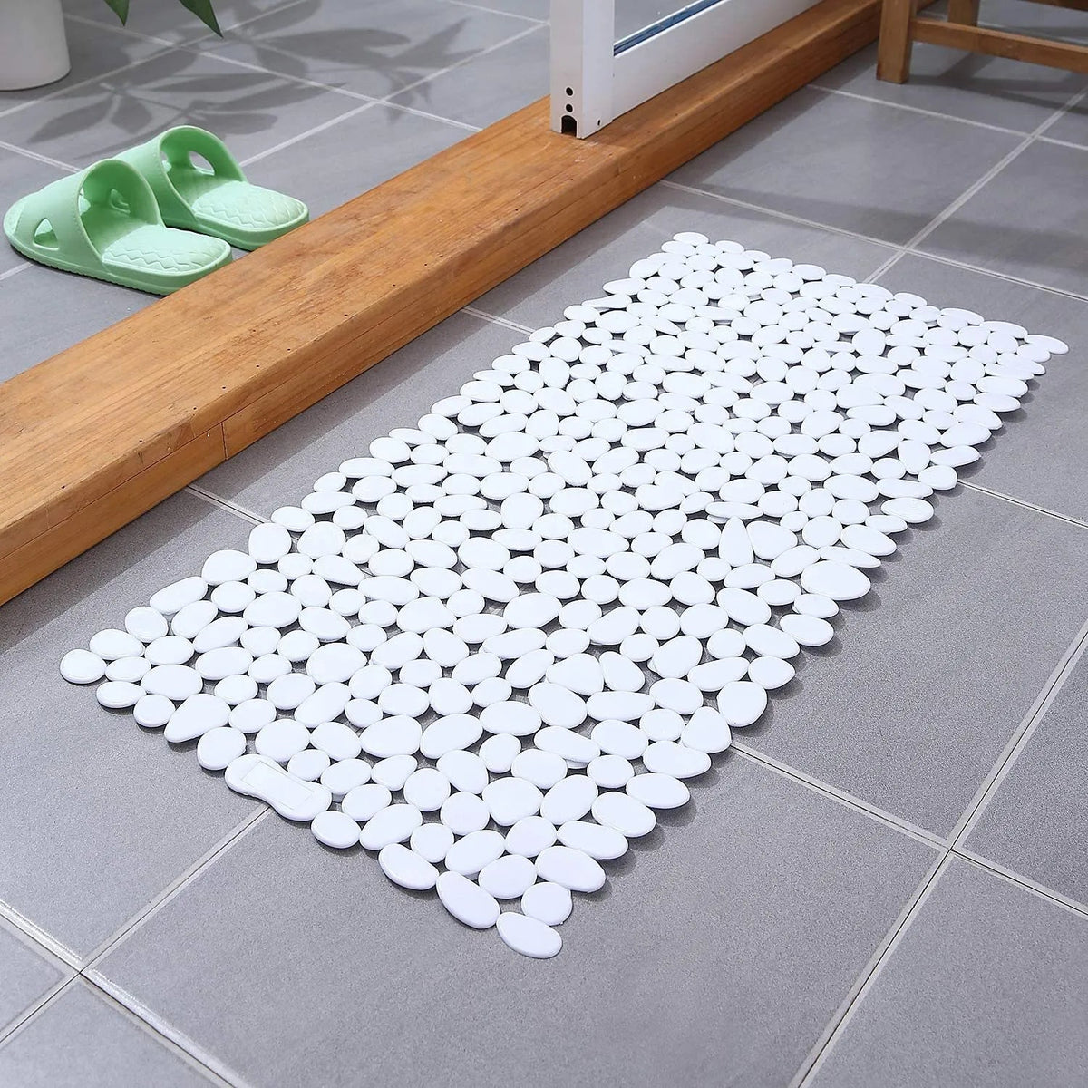 Kiezelvormige badmat met antislip zuignappen