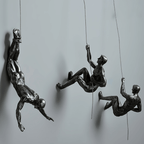 Klimmer Wandsculptuur Met Drie Figuren