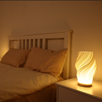 Golfvormige Tafellamp Met Sculpturale Vorm En Moderne Ledmodule