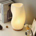 Golfvormige Tafellamp Met Sculpturale Vorm En Moderne Ledmodule