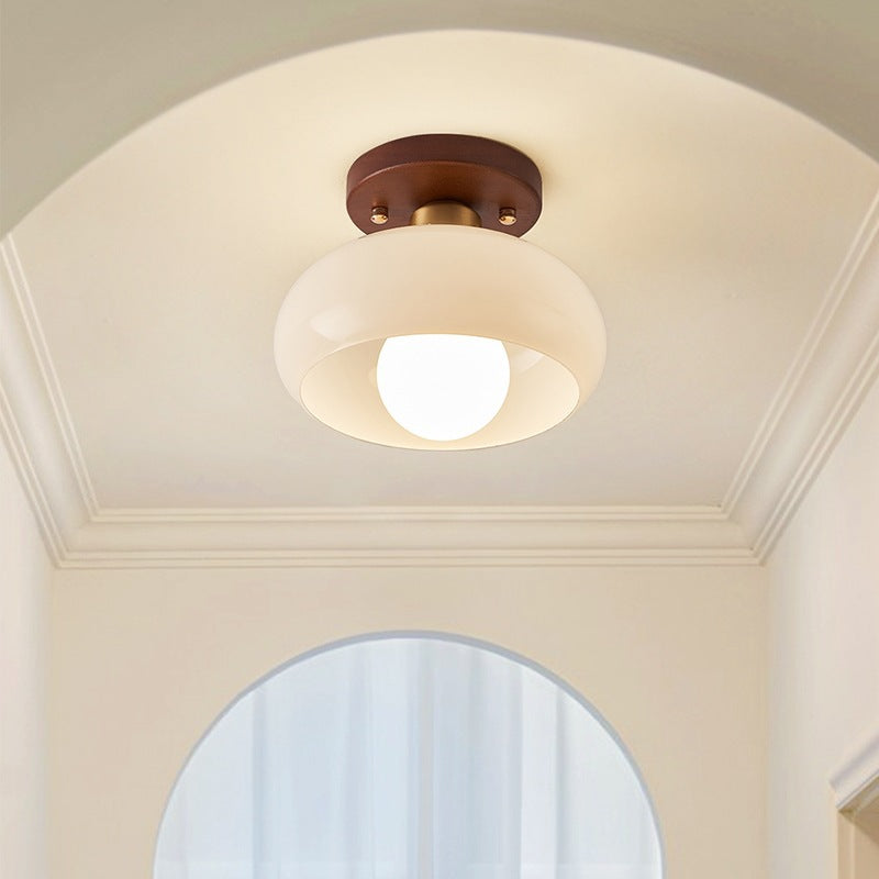Plafondlamp met ronde glazen kap ontwerp