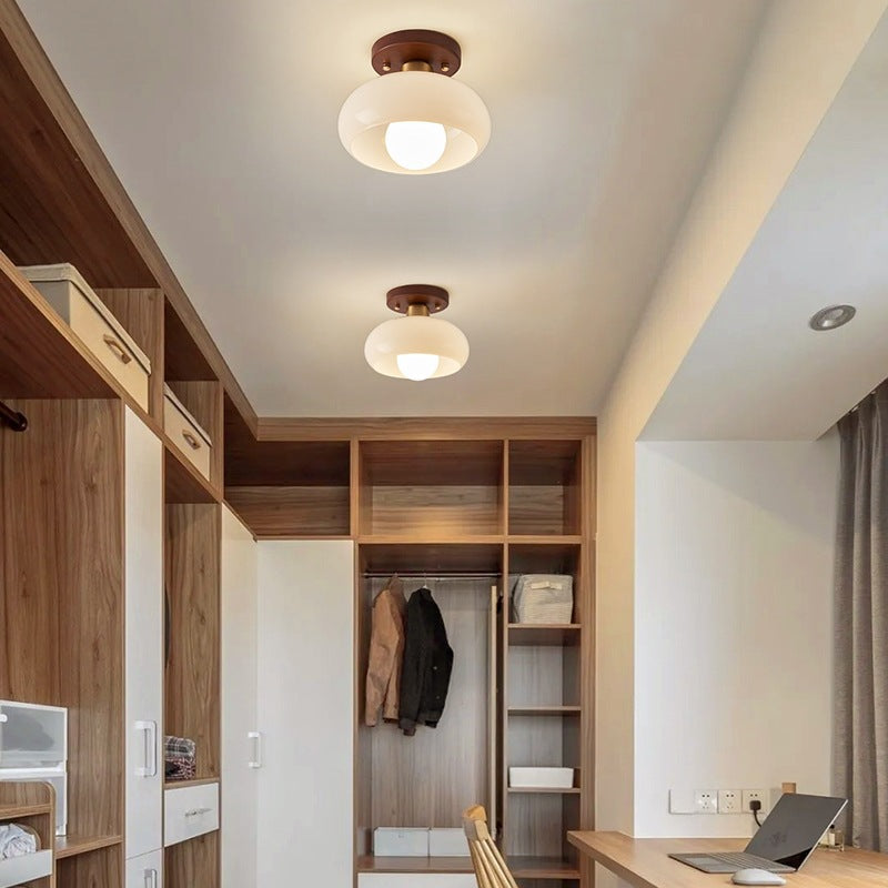 Plafondlamp met ronde glazen kap ontwerp