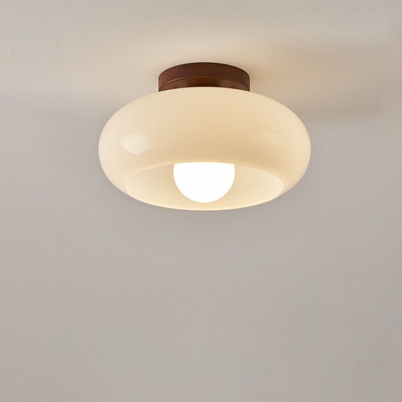 Plafondlamp met ronde glazen kap ontwerp