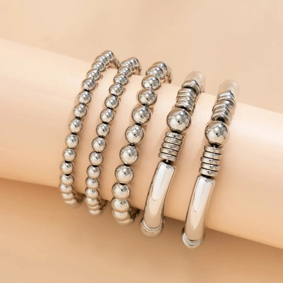 Vijfdelige kralenarmbandenset met elastische pasvorm