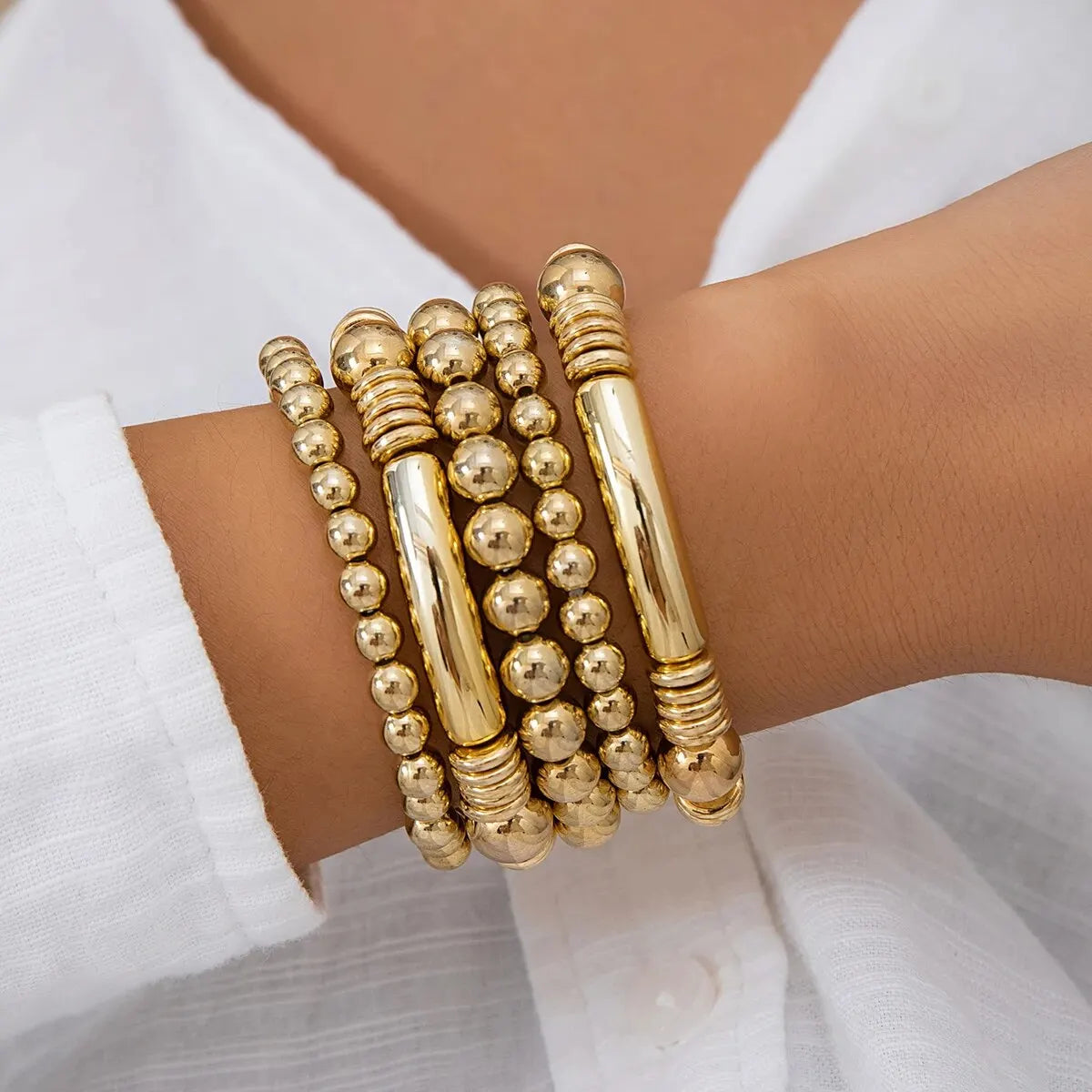Vijfdelige kralenarmbandenset met elastische pasvorm