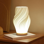 Golfvormige Tafellamp Met Sculpturale Vorm En Moderne Ledmodule