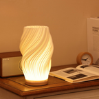 Golfvormige Tafellamp Met Sculpturale Vorm En Moderne Ledmodule