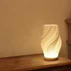 Golfvormige Tafellamp Met Sculpturale Vorm En Moderne Ledmodule