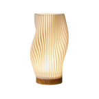 Golfvormige Tafellamp Met Sculpturale Vorm En Moderne Ledmodule