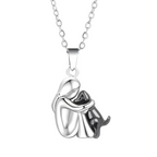 Hangerketting met omhelzende mens en hond voor dagelijks gebruik