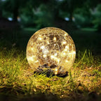 Solar Glasbol met Warm LED‑Licht en Gebarsten Glasstructuur
