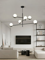 Moderne Hanglamp Met Glazen Bollen En Asymmetrisch Frame Voor Sfeervolle Verlichting