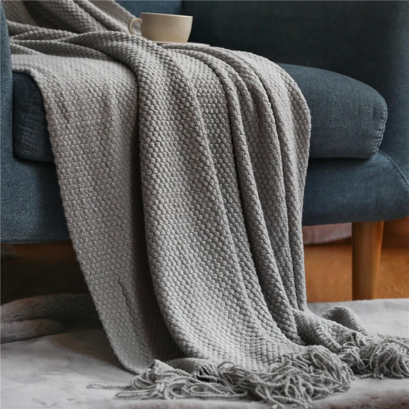 Luxe Merino‑Stijl Deken met Zachte Structuur en Decoratieve Kwastjes voor Warmte en Sfeer