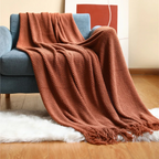 Luxe Merino‑Stijl Deken met Zachte Structuur en Decoratieve Kwastjes voor Warmte en Sfeer