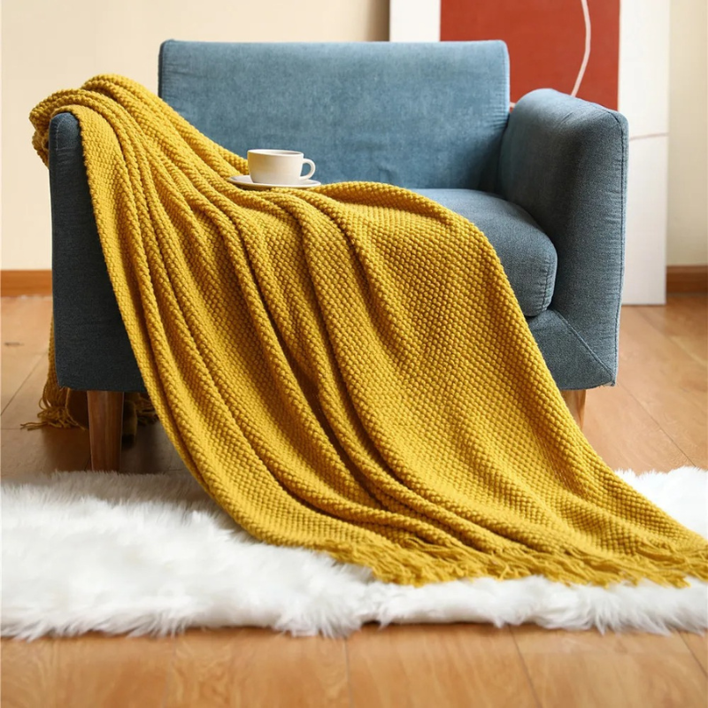Luxe Merino‑Stijl Deken met Zachte Structuur en Decoratieve Kwastjes voor Warmte en Sfeer