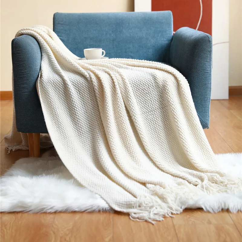 Luxe Merino‑Stijl Deken met Zachte Structuur en Decoratieve Kwastjes voor Warmte en Sfeer